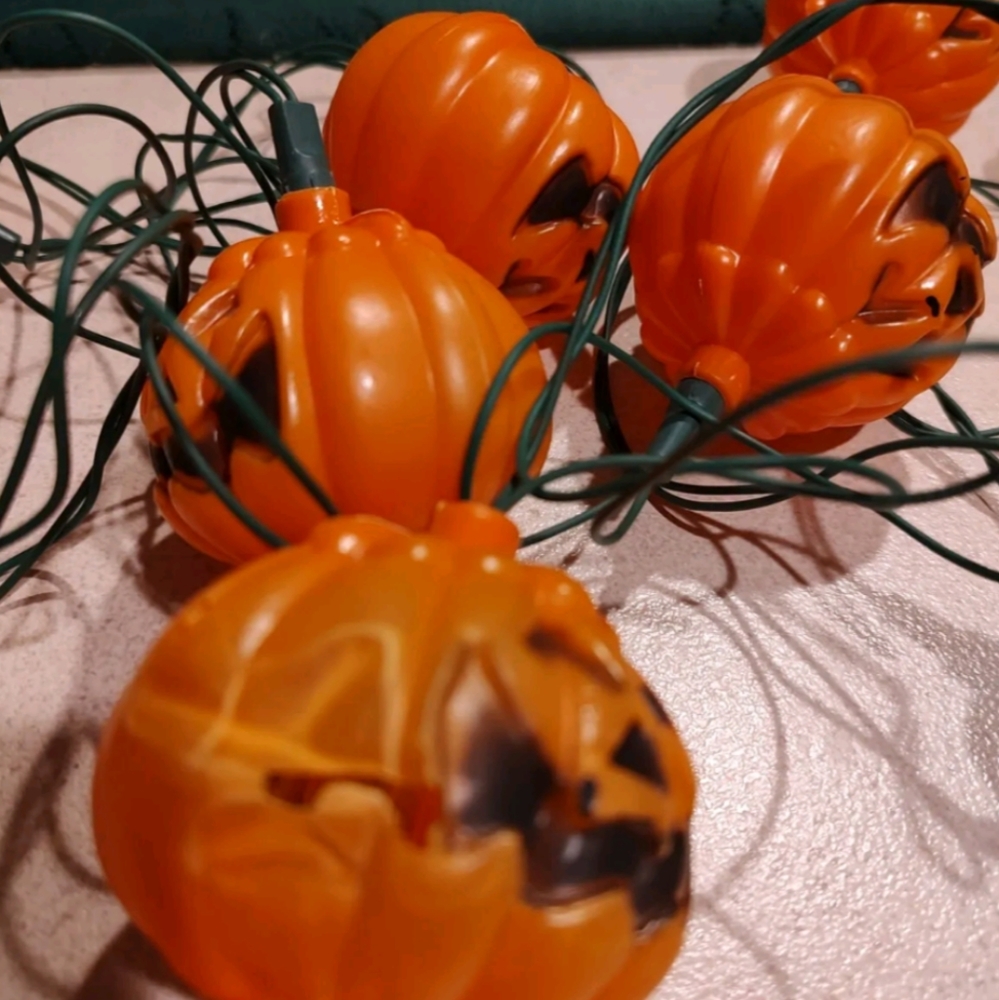 vintage charm to your Halloween decorations with these blinking string pumpkins